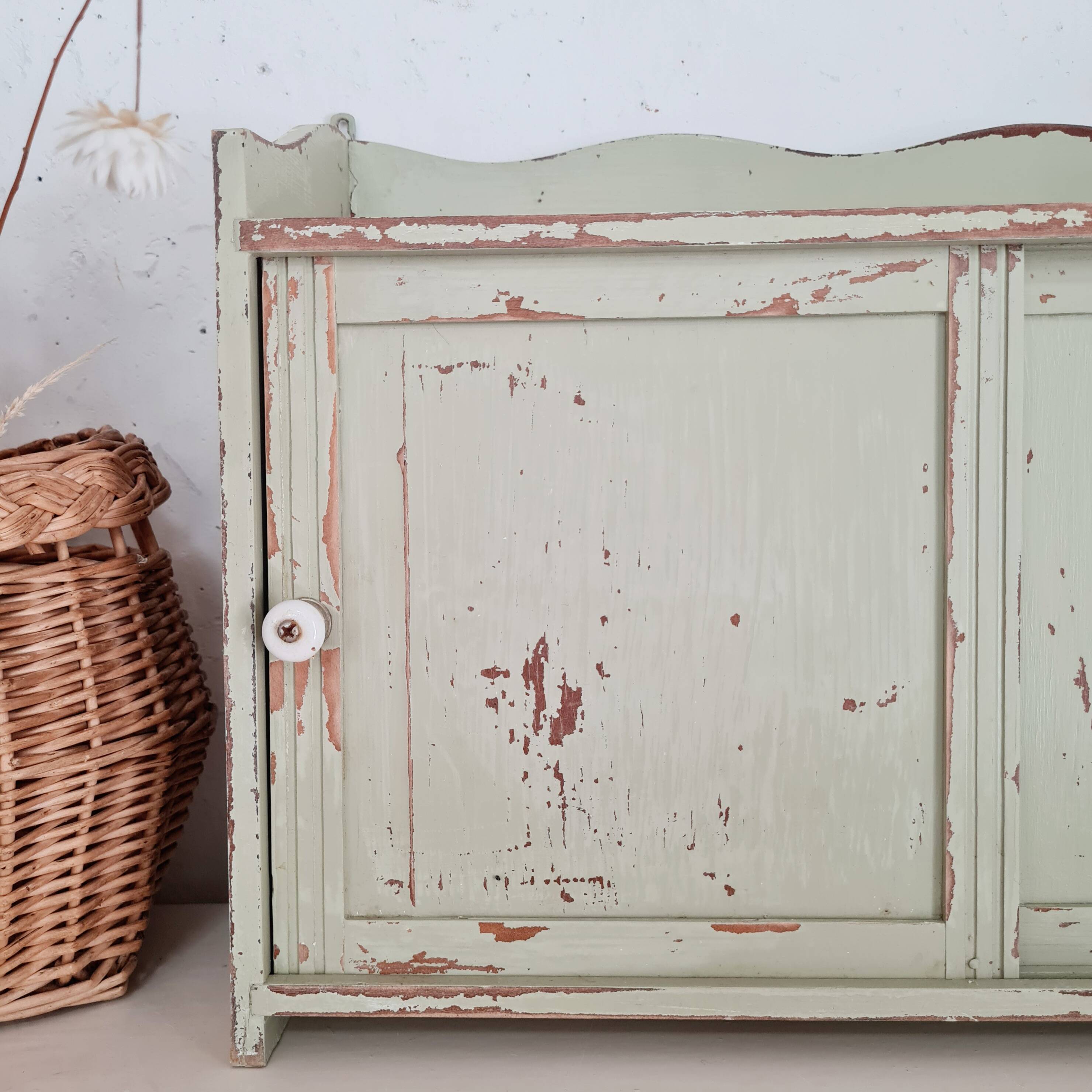 Small old wall shelf with sliding doors