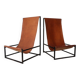 Paire de fauteuils vintage en cuir tendu et structure en métal