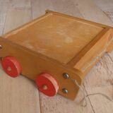 Old raw wood construction game in its cart