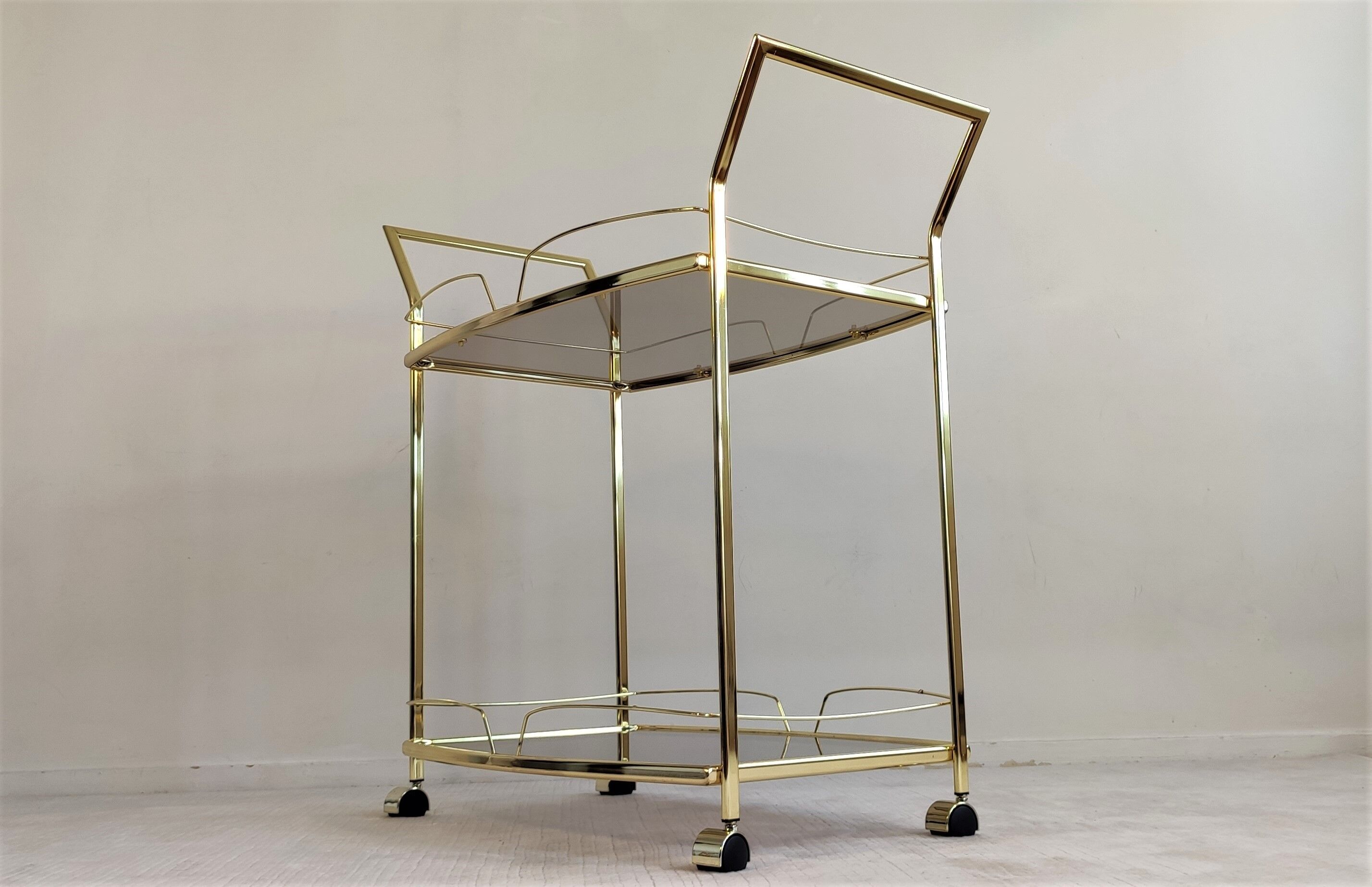 Serves golden trolley bar with wheels, in golden brass of the 80'S