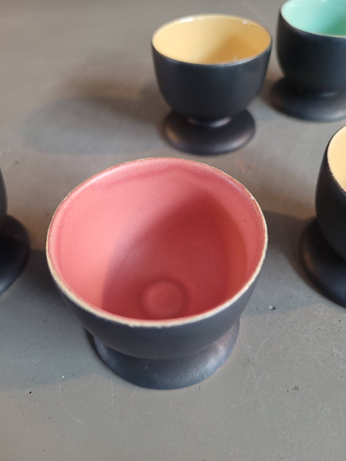 Set of 6 black and colored ceramic egg cups