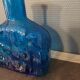 Blue molded glass bottle