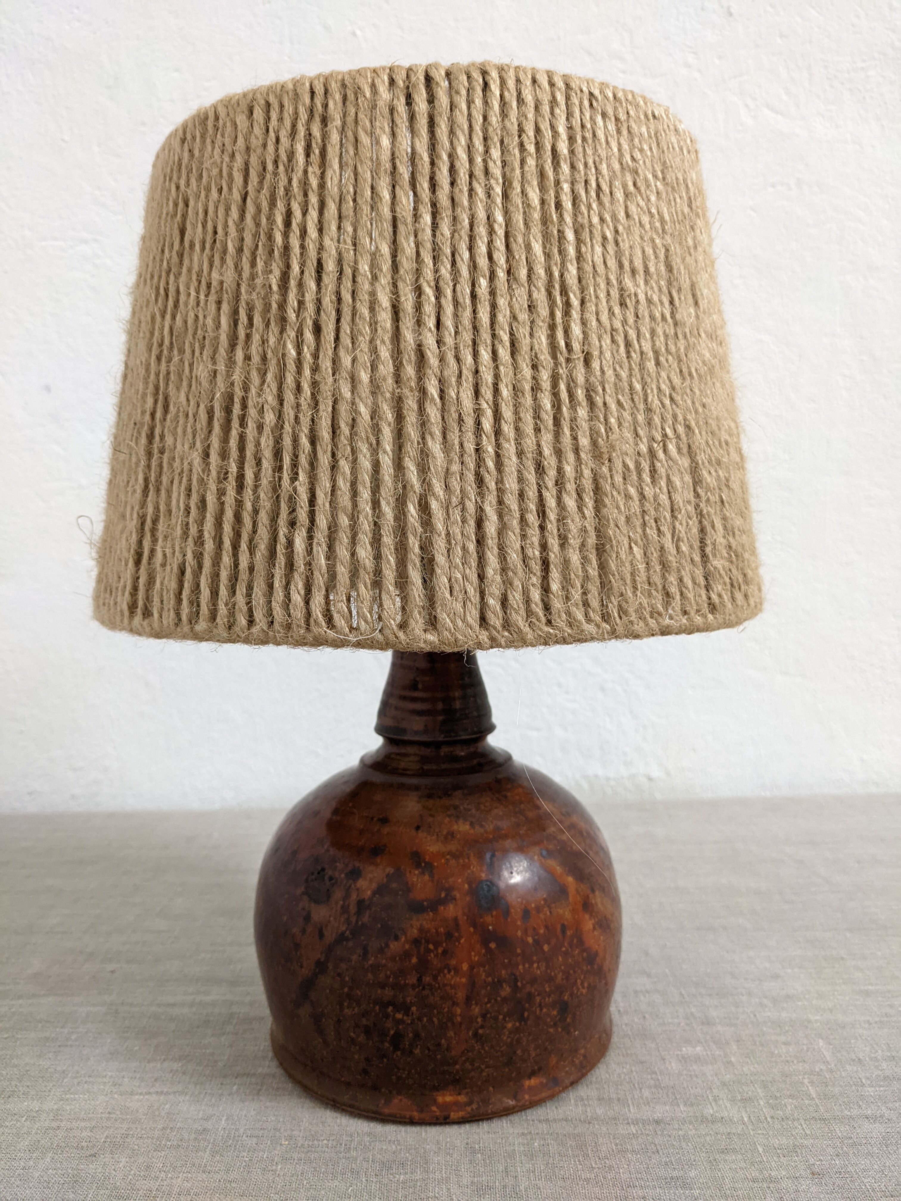Vintage varnished stoneware lamp and jute rope