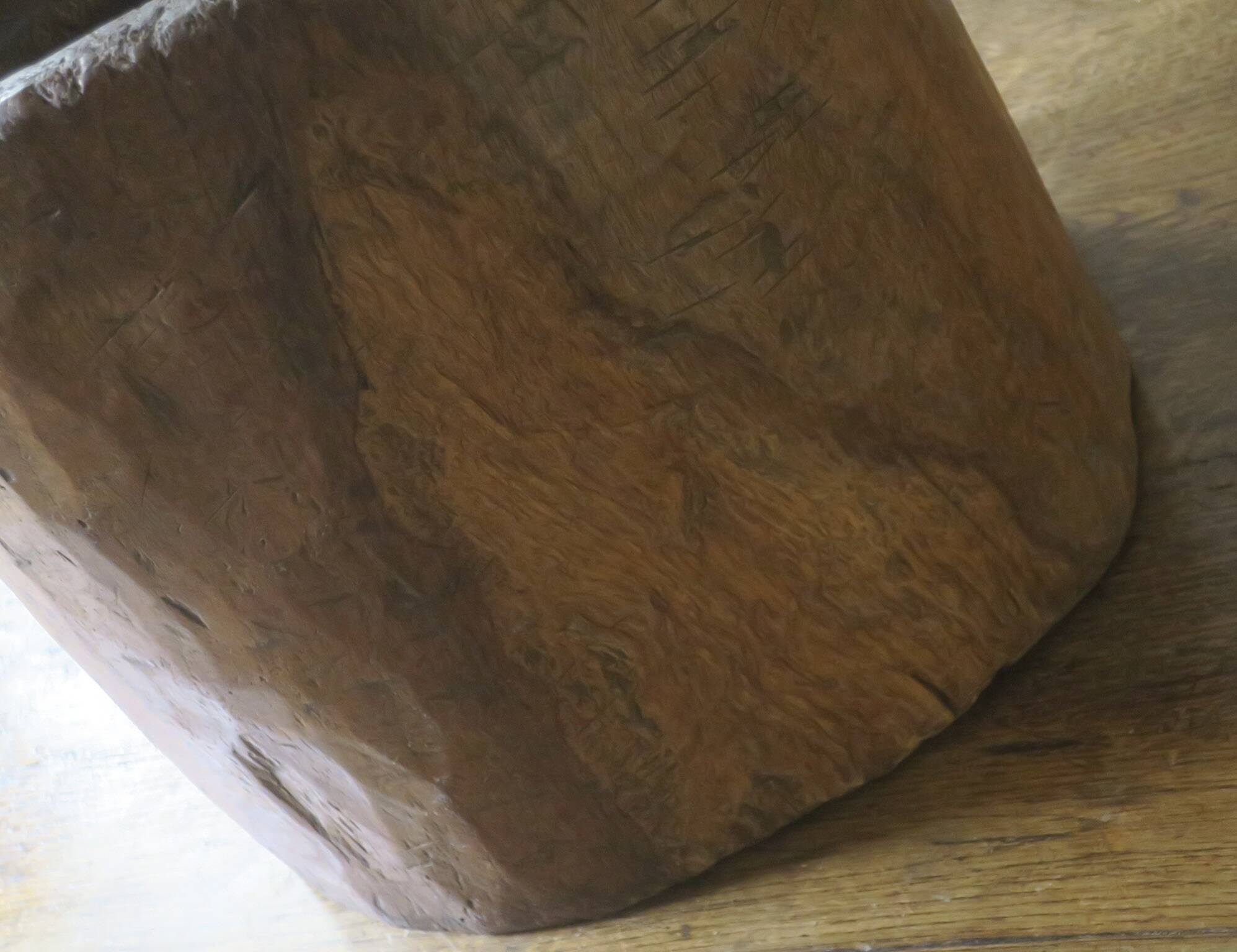 Carved antique tree stump coffee table with circular glass top