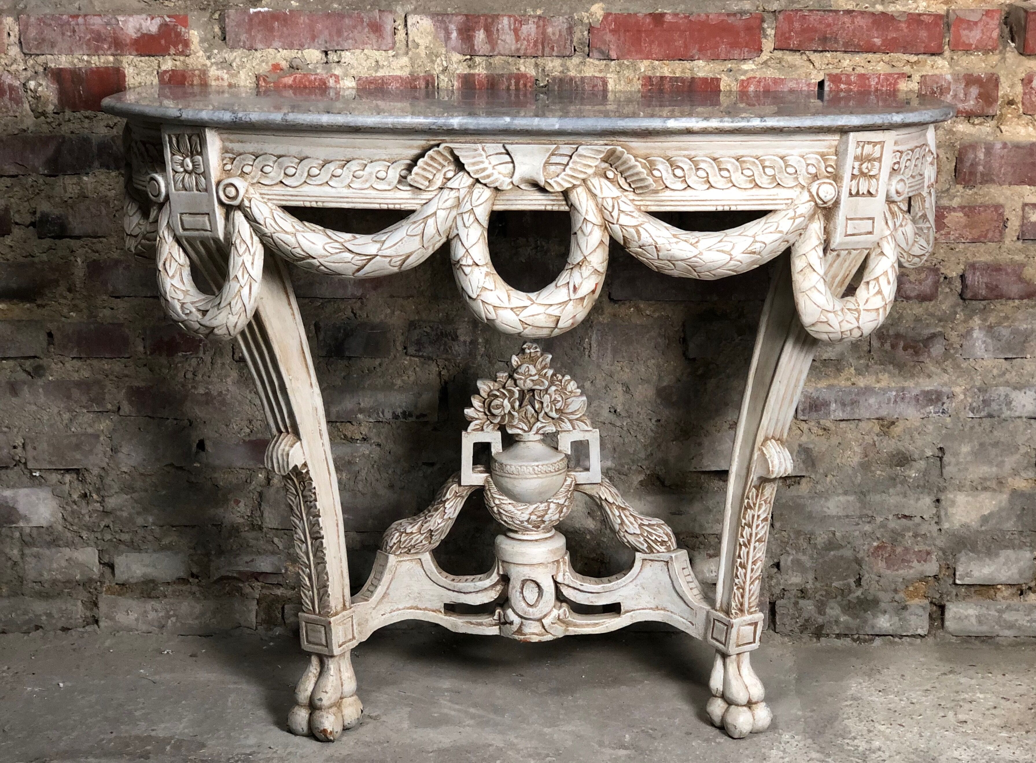 Louis XVI style console in carved wood beige patinated above gray marble