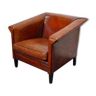 Vintage club armchair in leather color cognac Netherlands