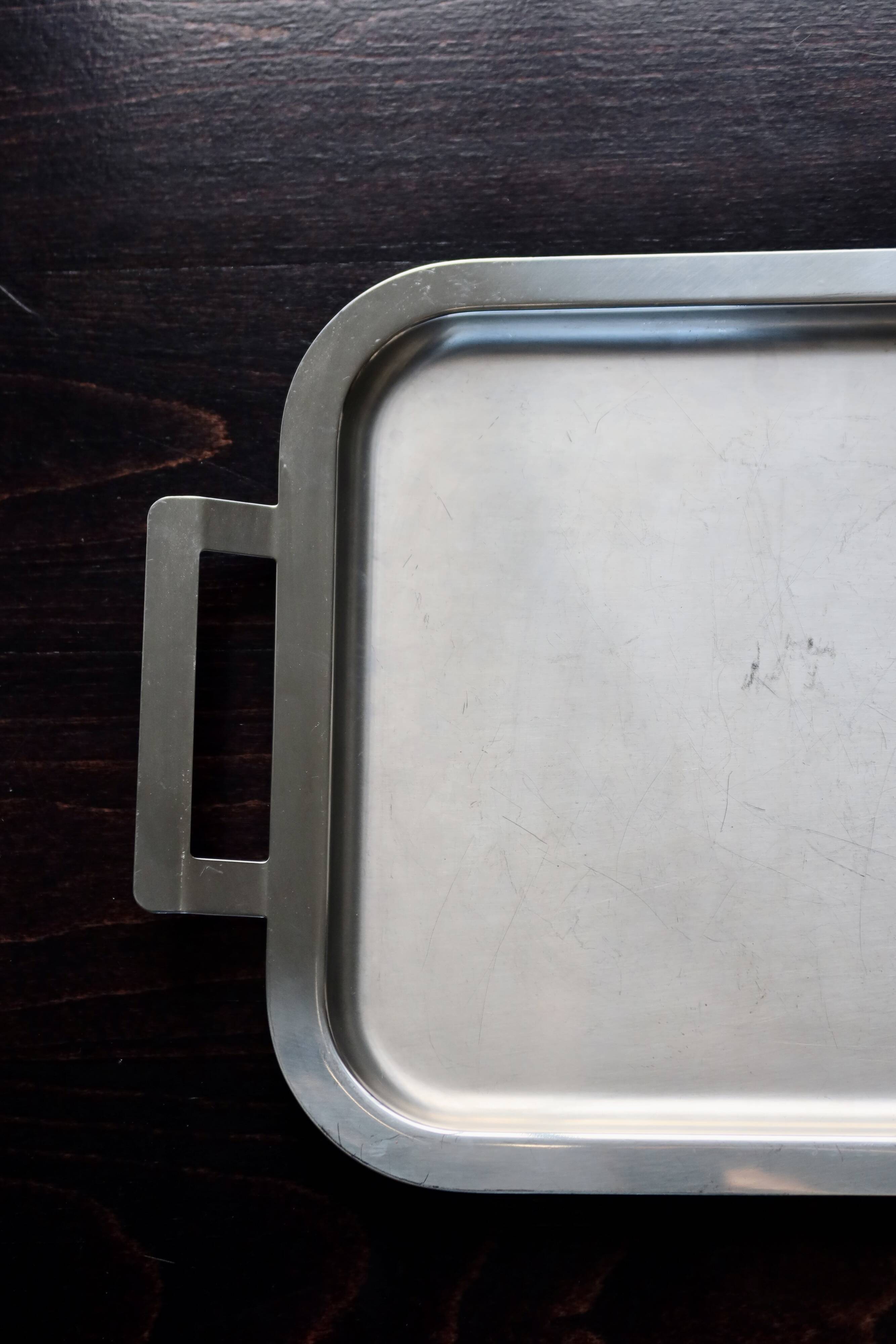 Vintage rectangular tray in shiny silver-plated metal.