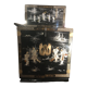 Asian lacquer cabinet with mother-of-pearl relief pattern