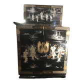 Asian lacquer cabinet with mother-of-pearl relief pattern