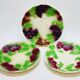 3 old plates in slip decoration strawberries and grapes