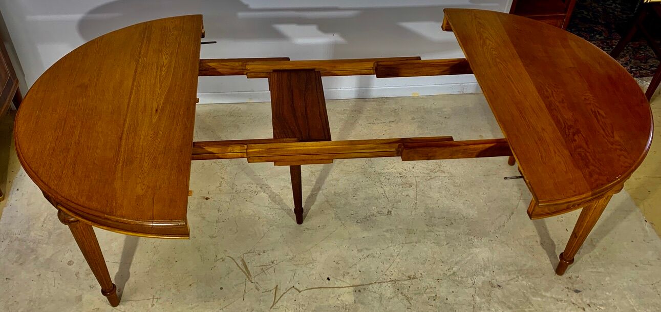 Louis XVI style table in oak with three extensions