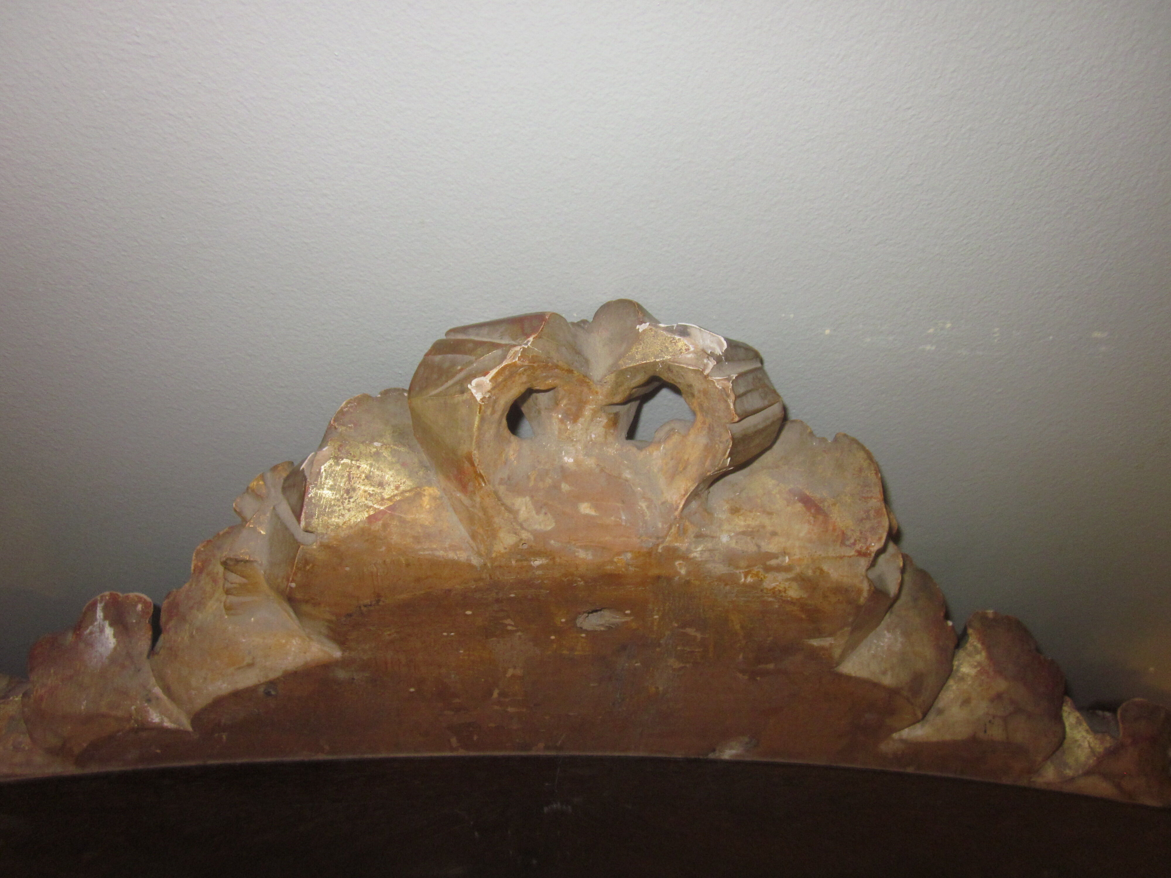 Old wooden pediment stucco
