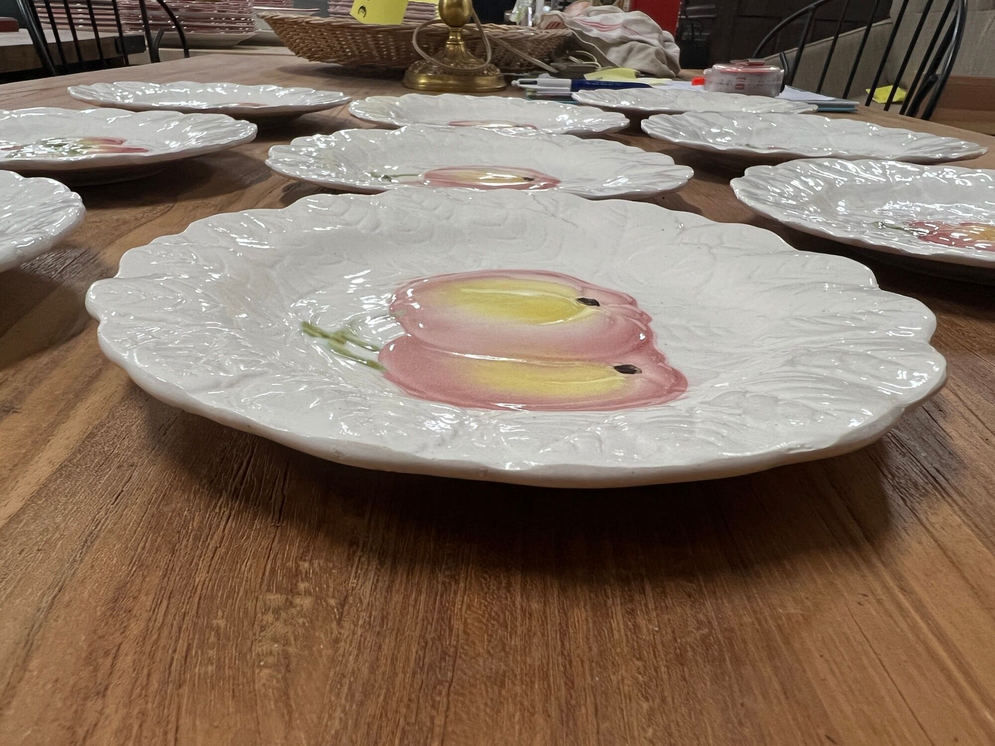 Set of 10 plates decorated with Sarreguemines porcelain fruit