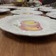 Set of 10 plates decorated with Sarreguemines porcelain fruit