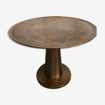 Gold-colored large round metal table