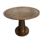 Table ronde de couleur or en métal