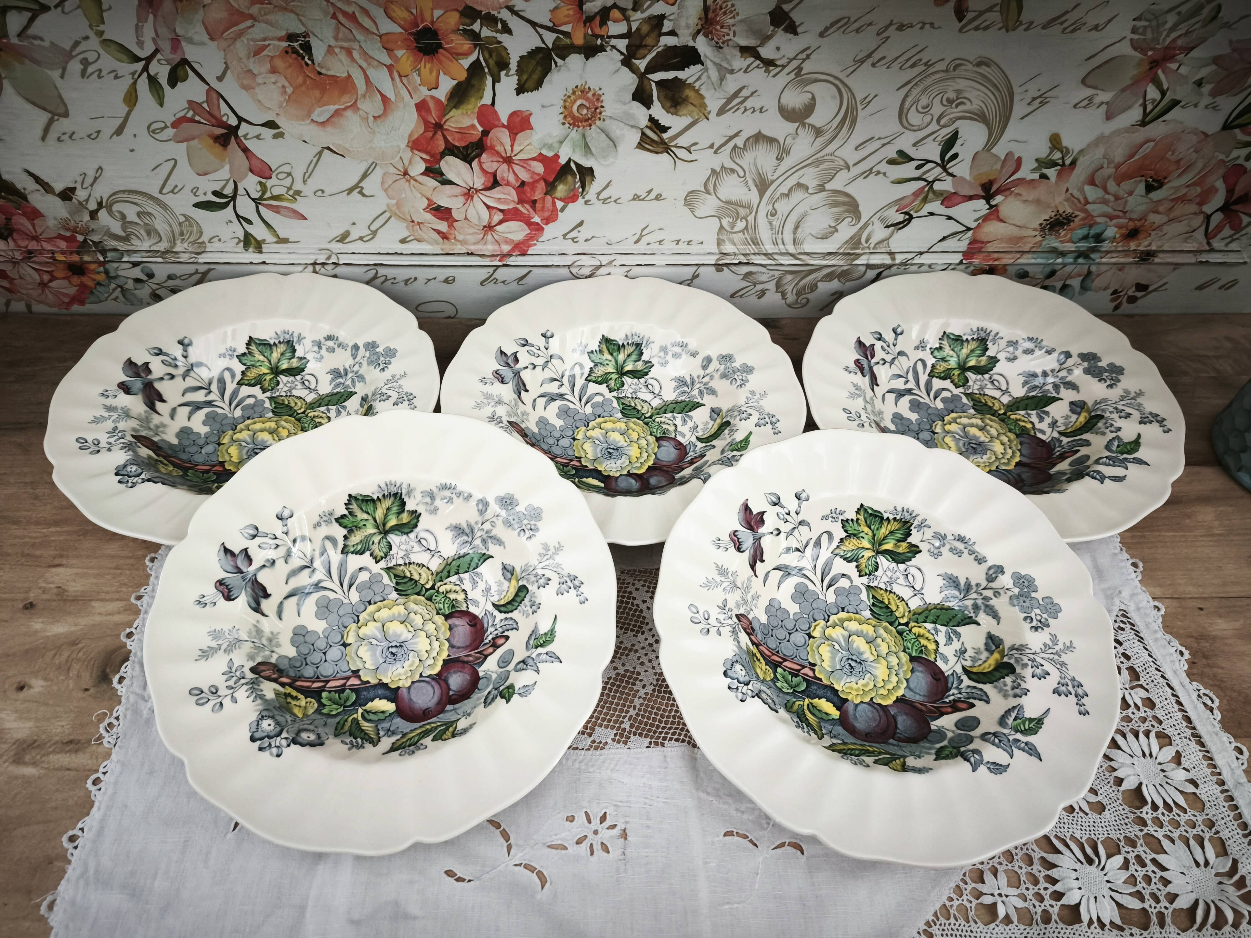 Set of 5 Royal Doulton deep plates in the Kirkwood pattern.