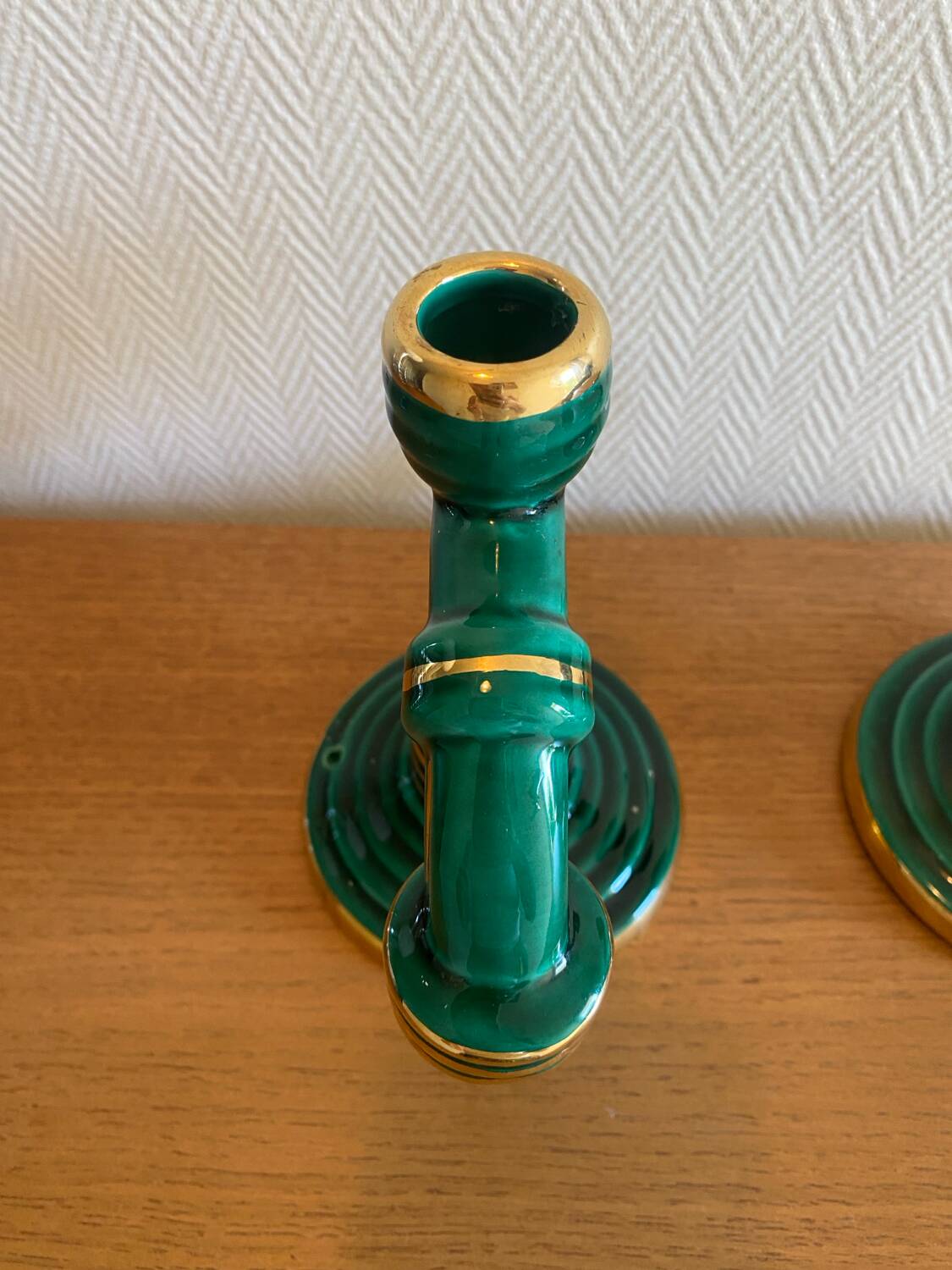 Pair of green and gold ceramic candlesticks