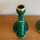Pair of green and gold ceramic candlesticks