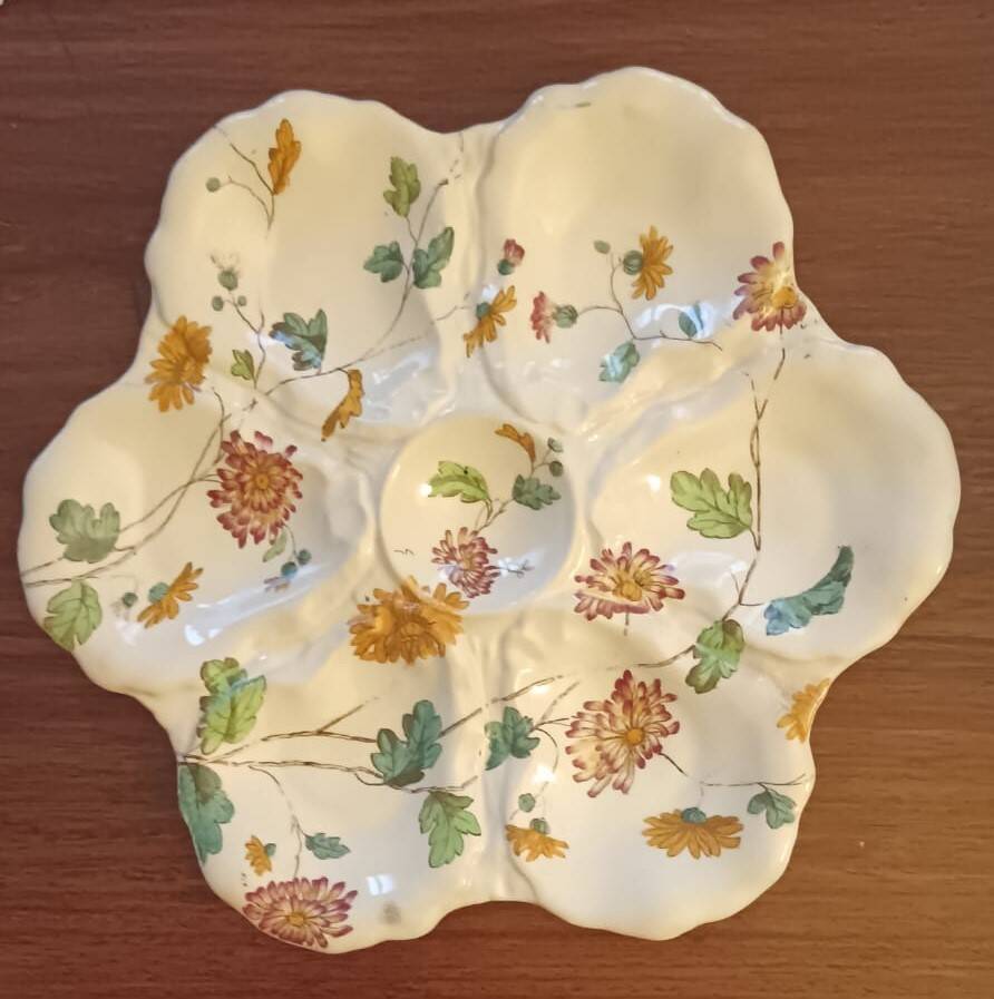 Antique English oyster plate from the late 19th to early 20th century.