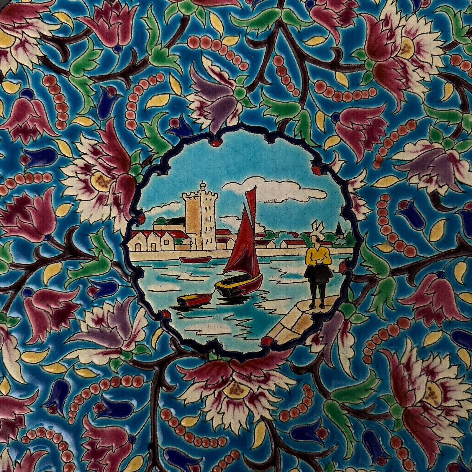 Longwy enamel dish decorated with a port scene