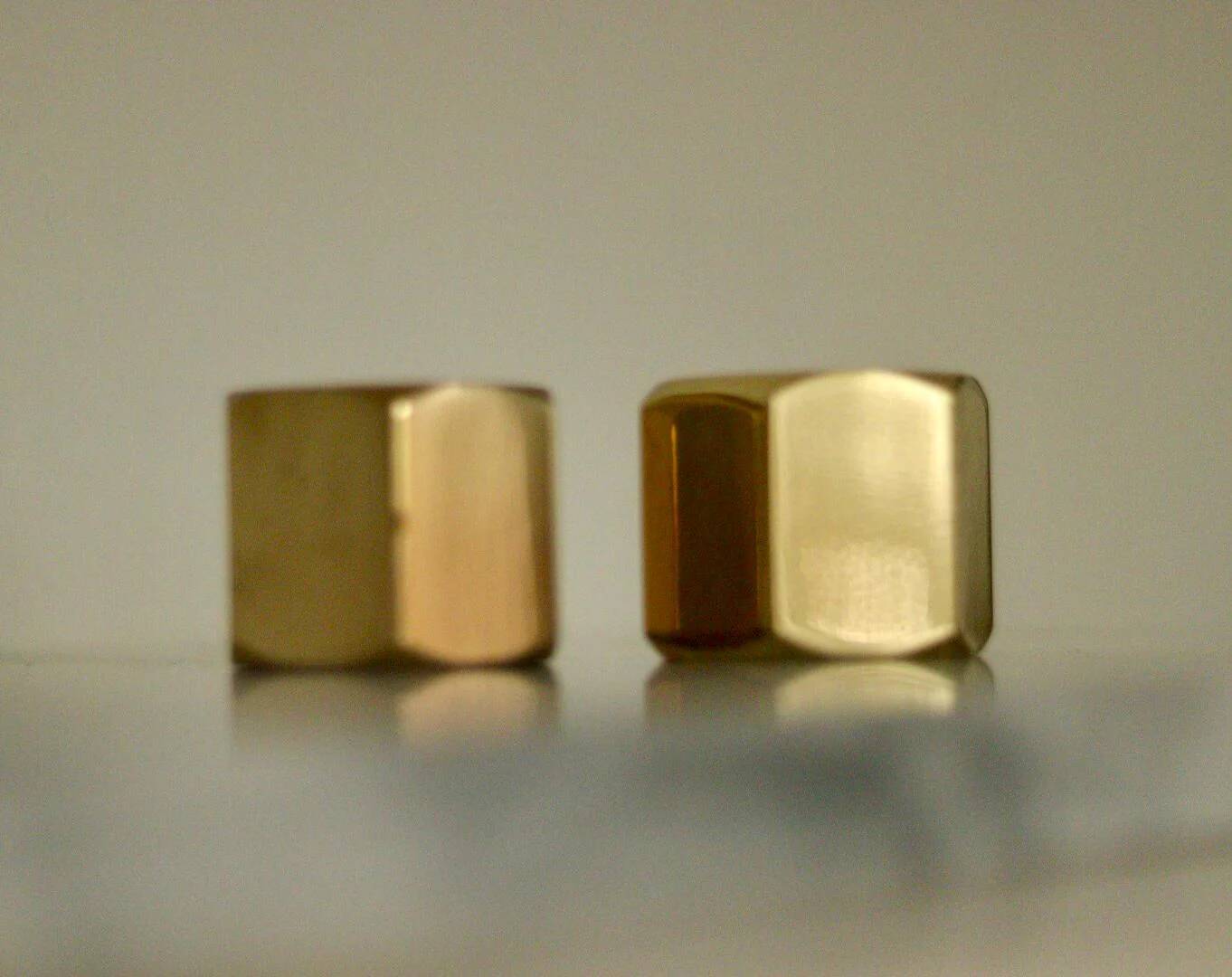 Pair of Swedish brass candlesticks from the mid-century by Inga Bjornsson Fakt