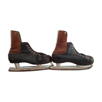 Pair of black and brown ice skates