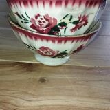Bowls Faïencerie de Sarreguemines with rose decoration (the two red ones)