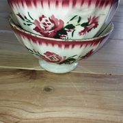 Bowls Faïencerie de Sarreguemines with rose decoration (the two red ones)
