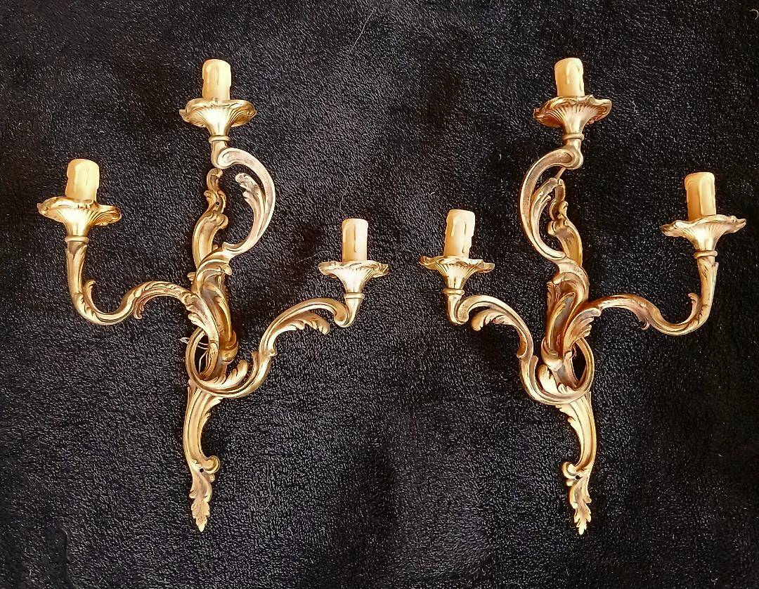 2 or more bronze wall lights in Louis XV rococo style with 3 arms.