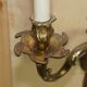 Pair of antique wall sconces from the 1920s in gilded bronze.