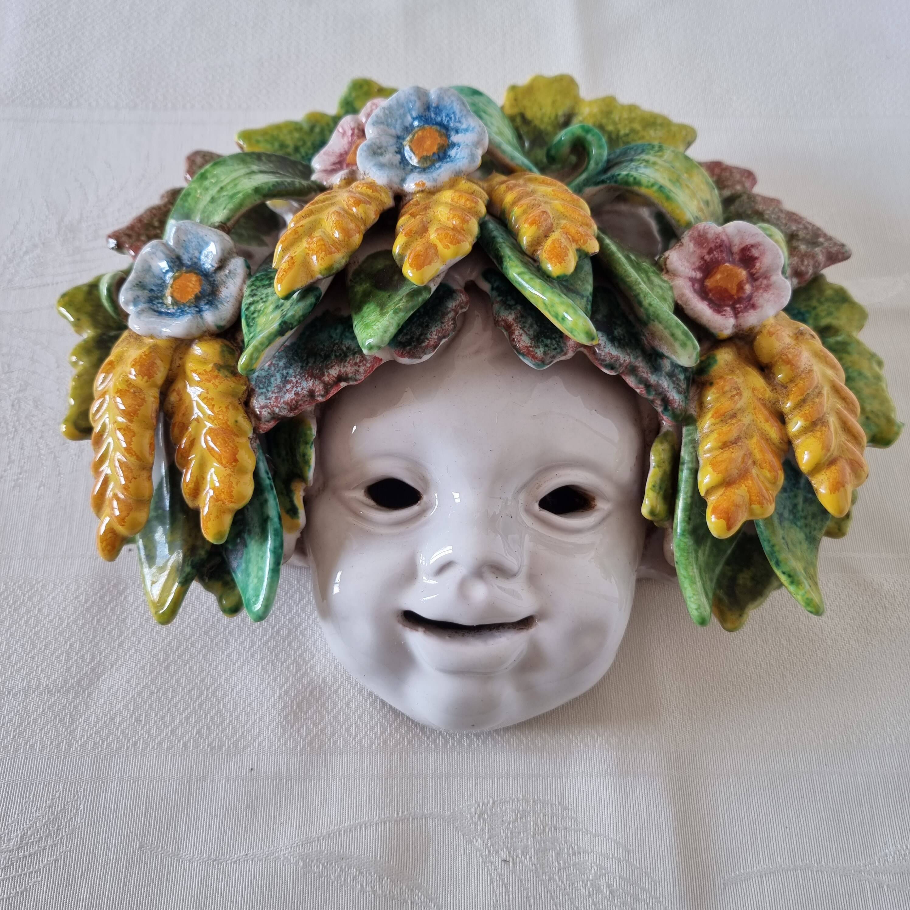 Vintage Italian ceramic wall mask, handmade, decorated with floral details