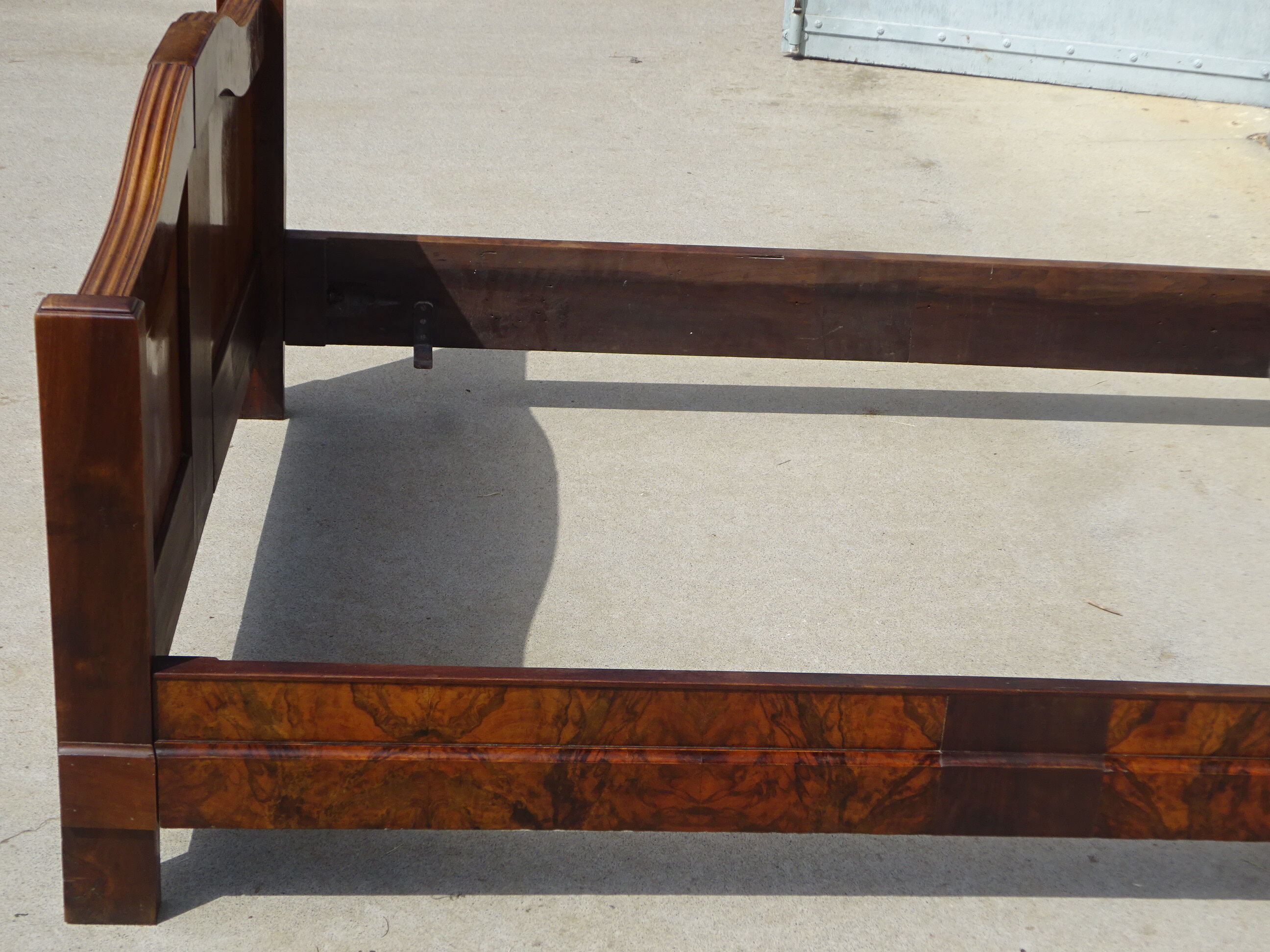 Walnut bed and walnut magnifying glass nineteenth century