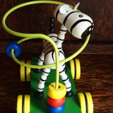 Old wooden toy, zebra car, to pull and push
