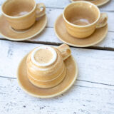 6 coffee cups and 6 sandstone saucers