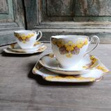 Set of two Caversham trios (cup, saucer and squared plate) , England, 1940s