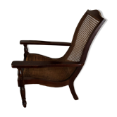 Fauteuil de planteur/colonial en bois foncé et cannage Reproduction 1990's