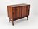 Low sideboard in rosewood with sliding doors. Denmark, 1960s