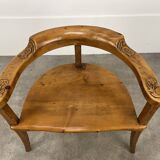 Chalet-style carved wooden tripod armchair
