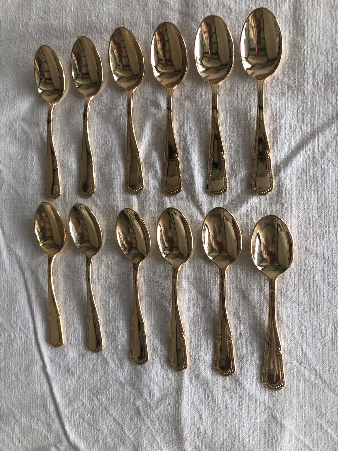 12 small teaspoons in Vintage golden metal