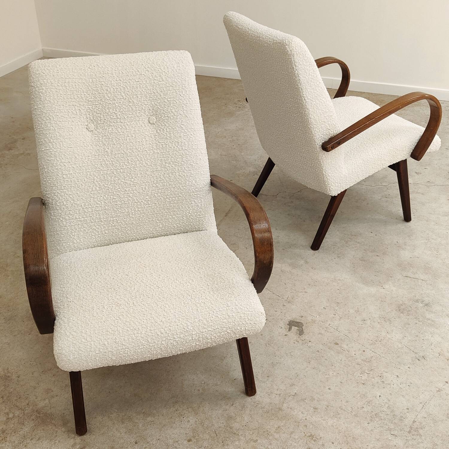 Pair of Jaroslav Smidek armchairs for Ton Bystrice, restored with white boucle, 1960.