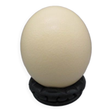 Ostrich egg on pedestal