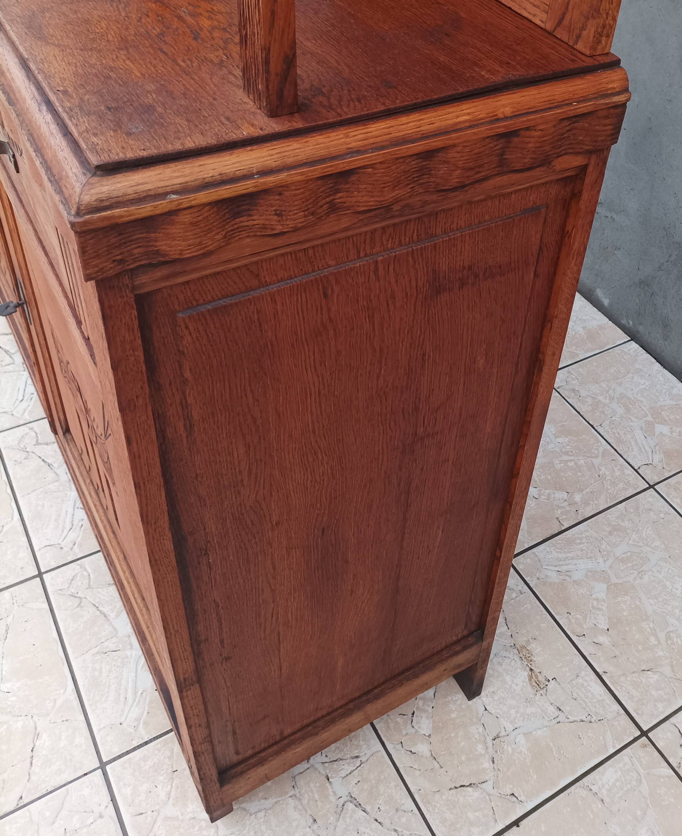Art Deco period carved oak sideboard