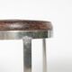Tabouret rond de style Industriel, en métal et cuir. Années 1970