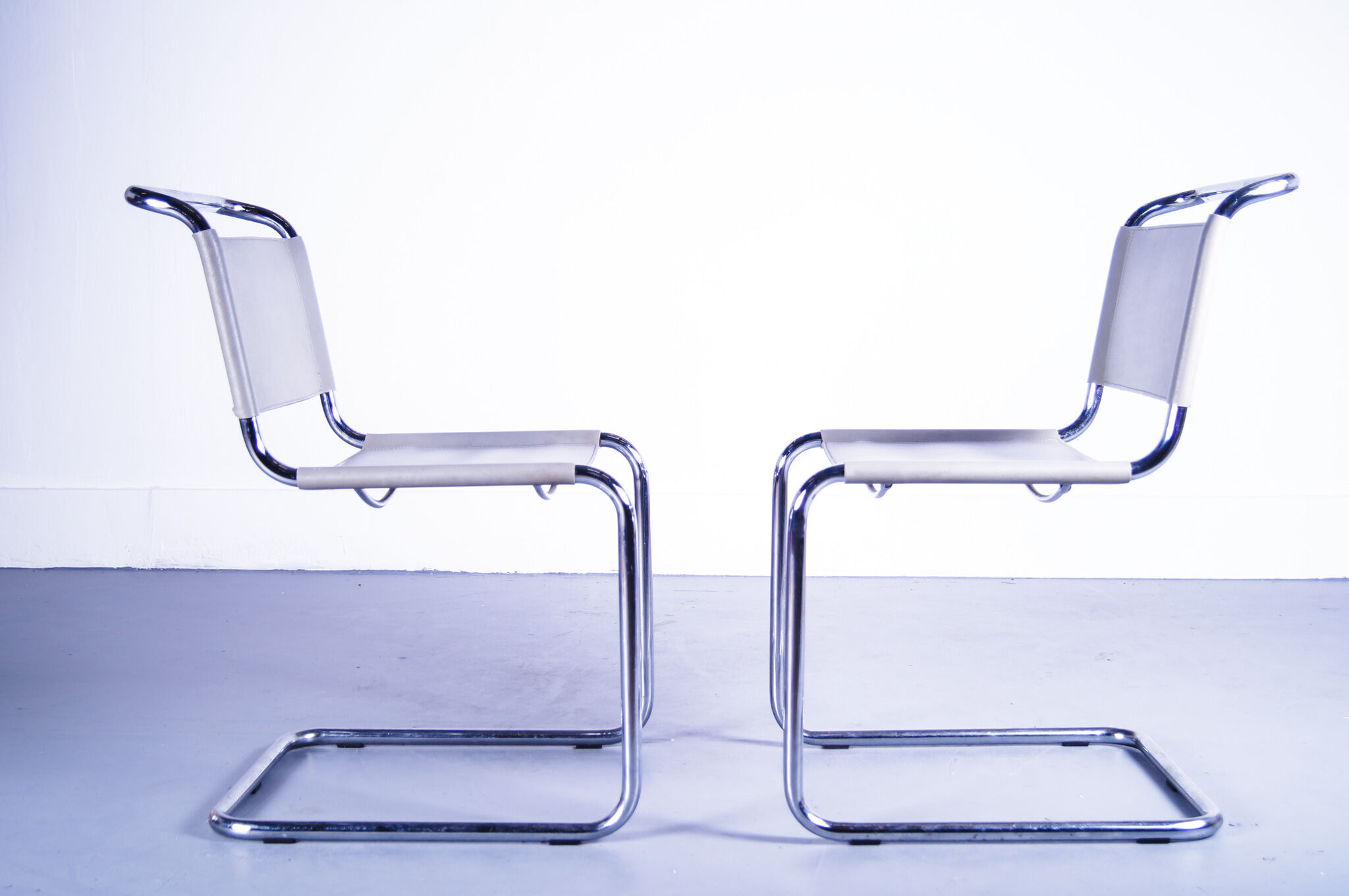 Set of 2  italian grey leather cantilever seats