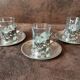 Set of 3 small metal glasses and saucers