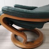 Mid - century leather armchair with footrest with relax function from himolla