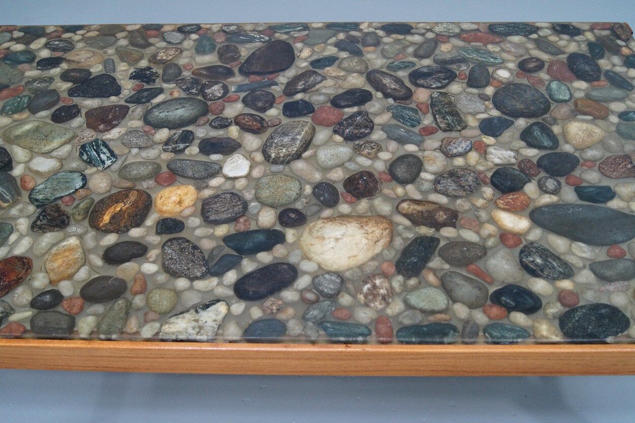 Swedish rosewood and pebbles coffee table in the style of Ib Kofod-Larsen , 1960s