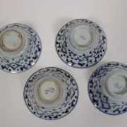 Set of 4 Chinese blue and white bowls with lotus scrolls – 19th century