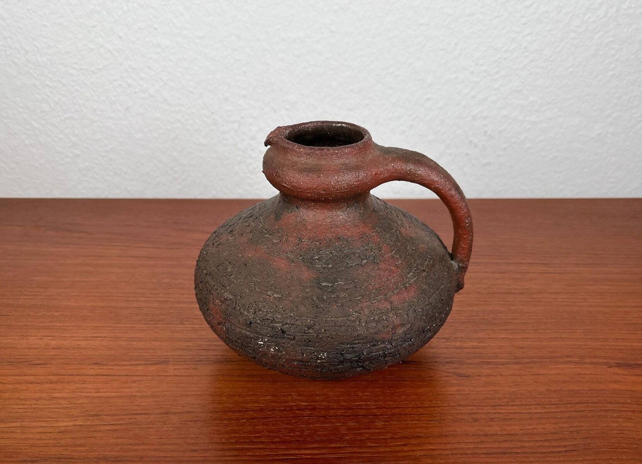Carafe vase by German studio pottery, brutalist vintage by Gerhard Liebenthron, 1974.